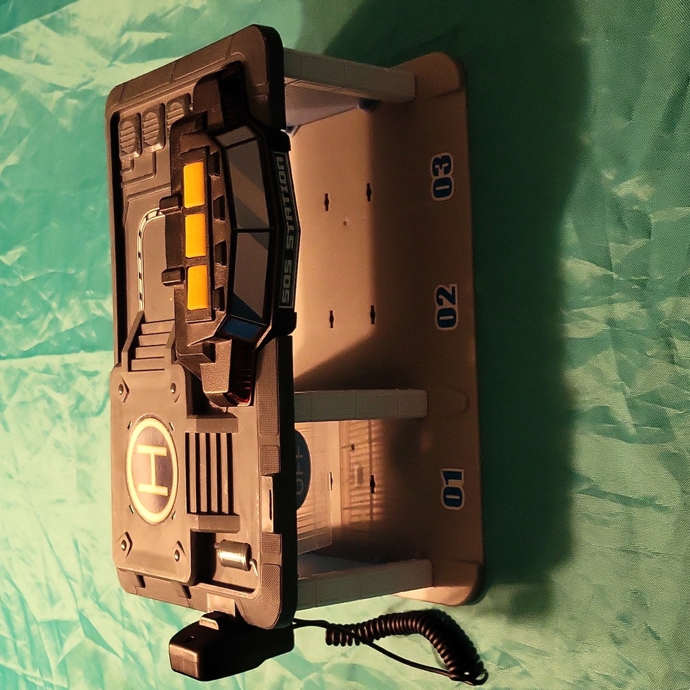 SOS Station with buttons for sirens and walkie talkie, needs batteries